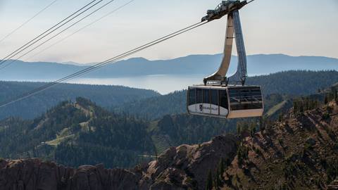 the aerial tram on a summer day with lake tahoe in the background
