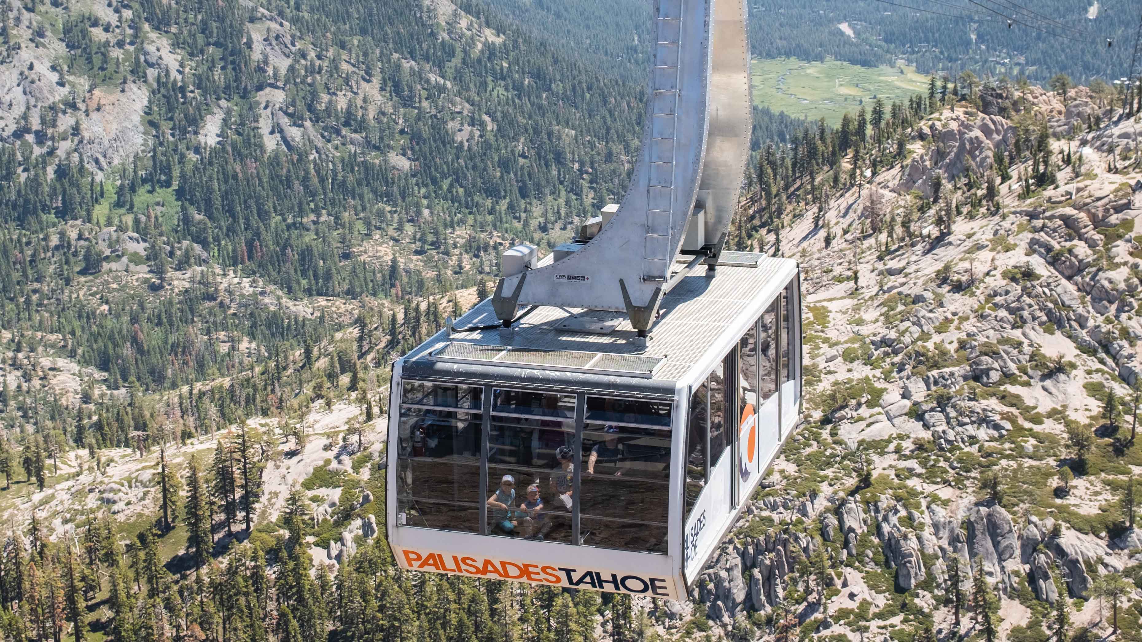 The Aerial Tram soars over Olympic Valley in the summer.