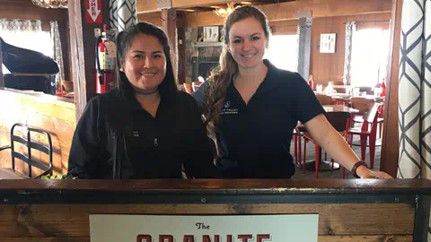 Two female employees of the Granite Bistro Eatery.