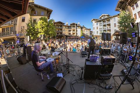 Bluesdays at Palisades Tahoe band facing a crowd in The Village