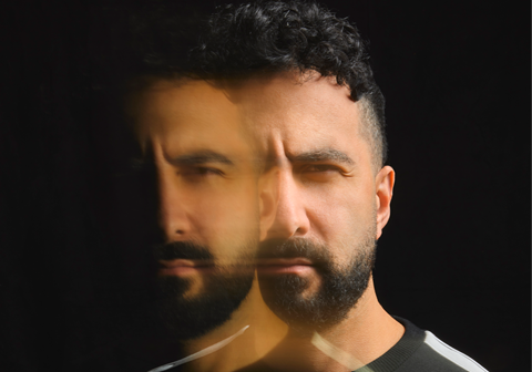 Valentino Khan promotional image with face and reflection