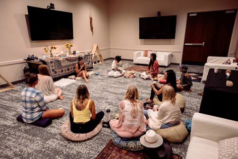Group sitting and reflecting in a circle