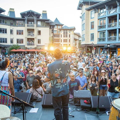Brews, Jazz, and Funk concert at Palisades Tahoe with crowd and band
