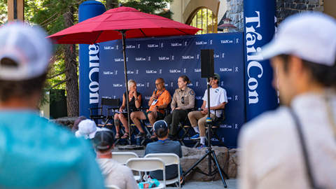 Group of panelists being interviewed at Trail Con