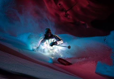 Chris Benchetler skiing at night