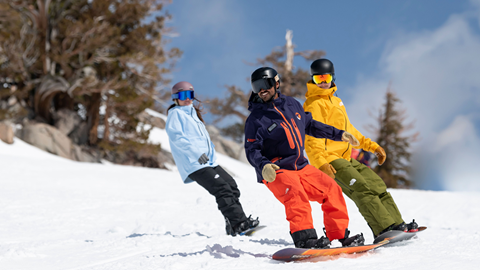Snowboarders with an instructor