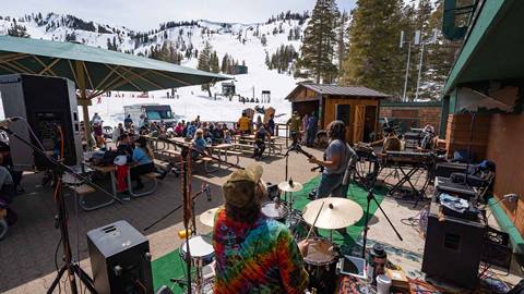 A band plays live music on the Alpine deck,