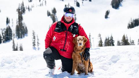 Handler with avalanche dog.