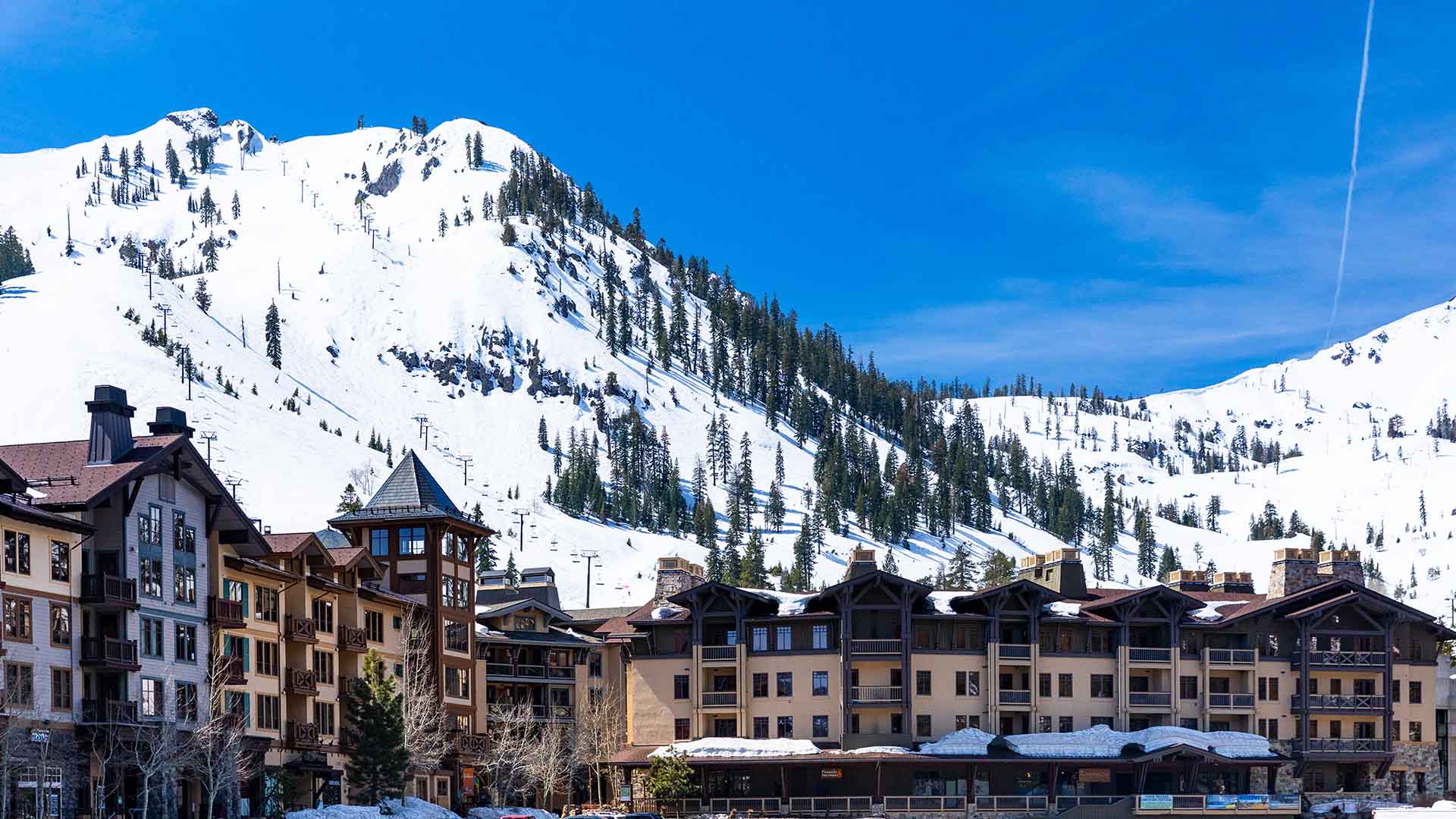A view of The Village at Palisades Tahoe and the legendary KT-22 chairlift. 