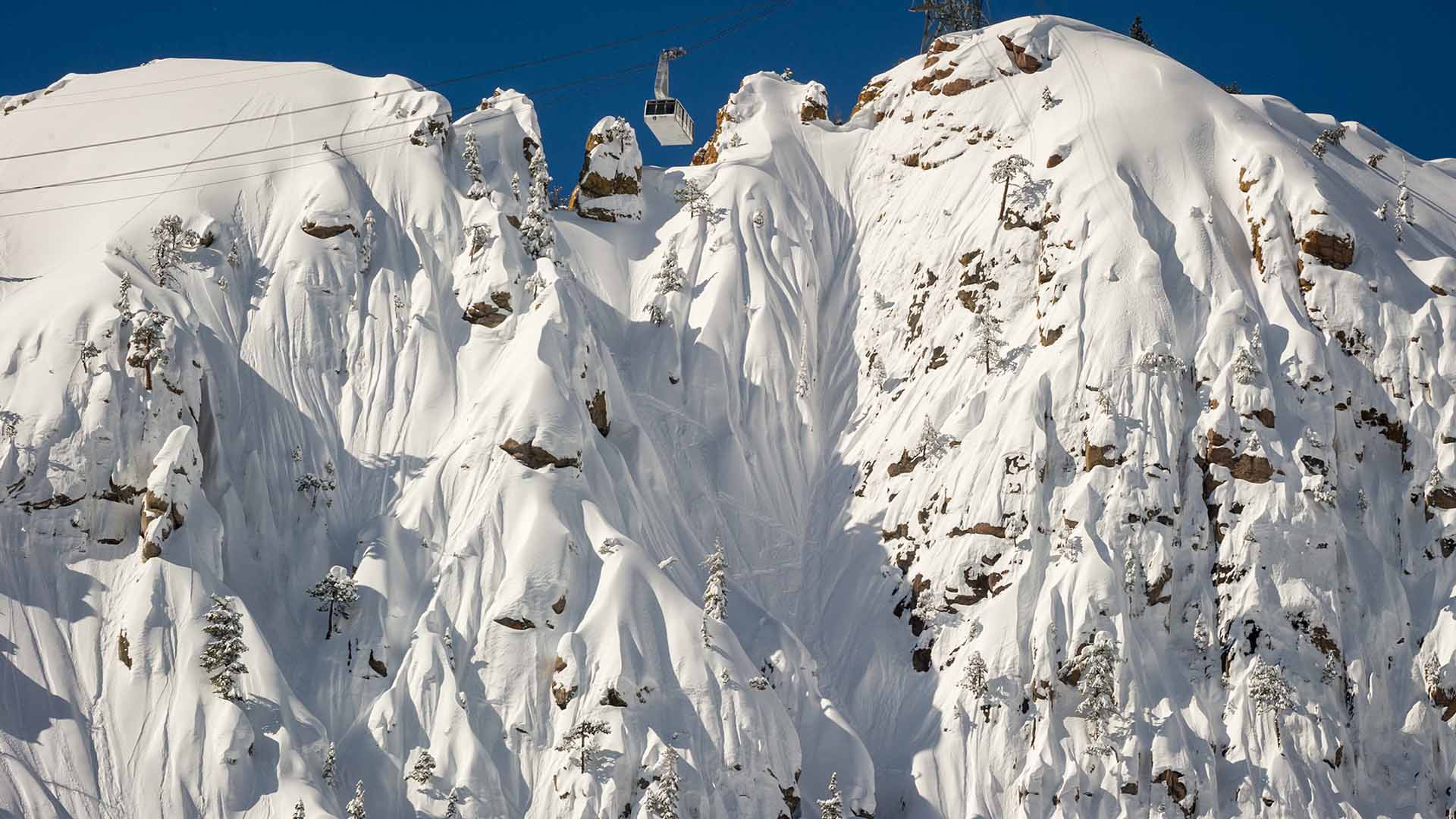 The iconic Tram Face at Palisades Tahoe, completely filled in after a heavy snowfall.