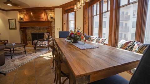 The dining room table with a view in the Eagles Nest Suite.