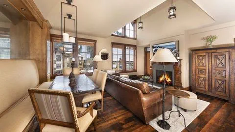 The living room and fireplace in the Alpine Suite. 