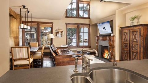 The living area of the Alpine Room Suite with Red Dog views.