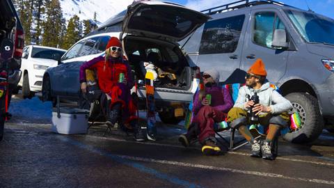 People hanging out in the parking lot at Palisades Tahoe.