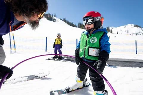Kid skiing at Palisades Tahoe 