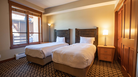 A standard 2 bedroom with twins in The Village at Palisades Tahoe.