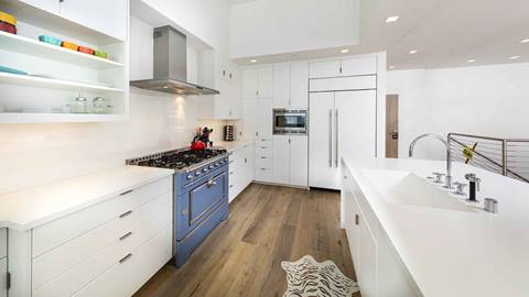 The bright kitchen in the Snow King Suite.