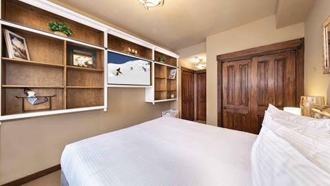 The master bedroom in the Alpine Room Suite