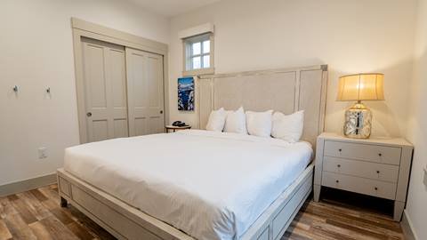 King sized bed pictured in the Granite Peak Terrace room.