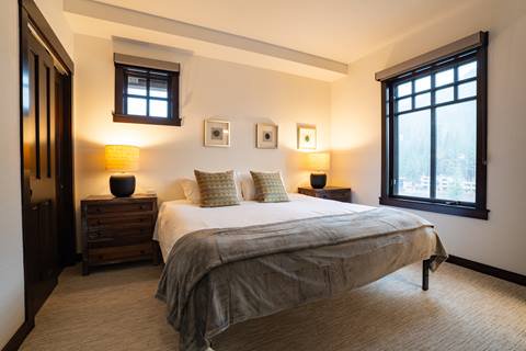 Interior image of a bedroom in the Douglas Fir suite