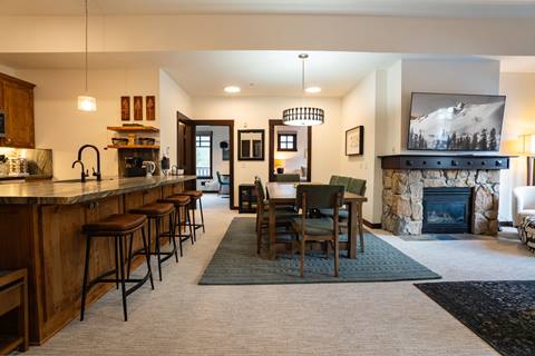 Interior image of the living and dining area in the Douglas Fir suite