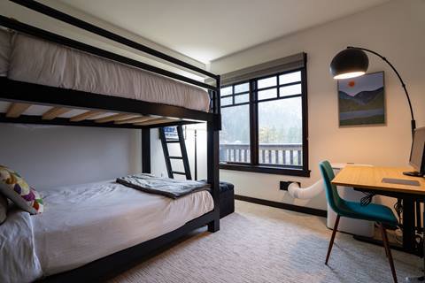 Interior image of a bedroom in the Douglas Fir suite