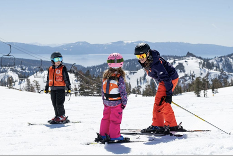 Two little ones receive instruction from a Palisades Tahoe instructor. 