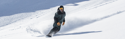 Jeremy Jones riding powder at Palisades Tahoe