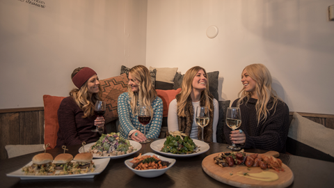 Four girls enjoying dinner at Rocker