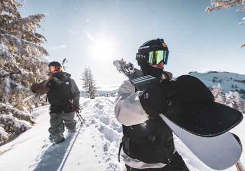 Two skiers hiking in powder