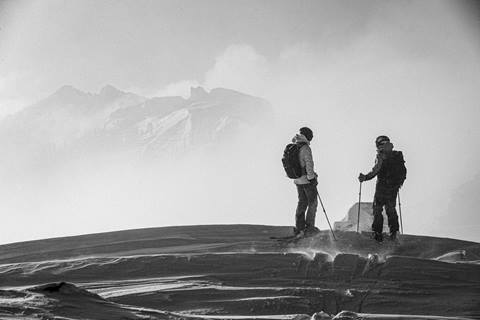 Skier Duo on a Palisades Tahoe Scenic Ridge 