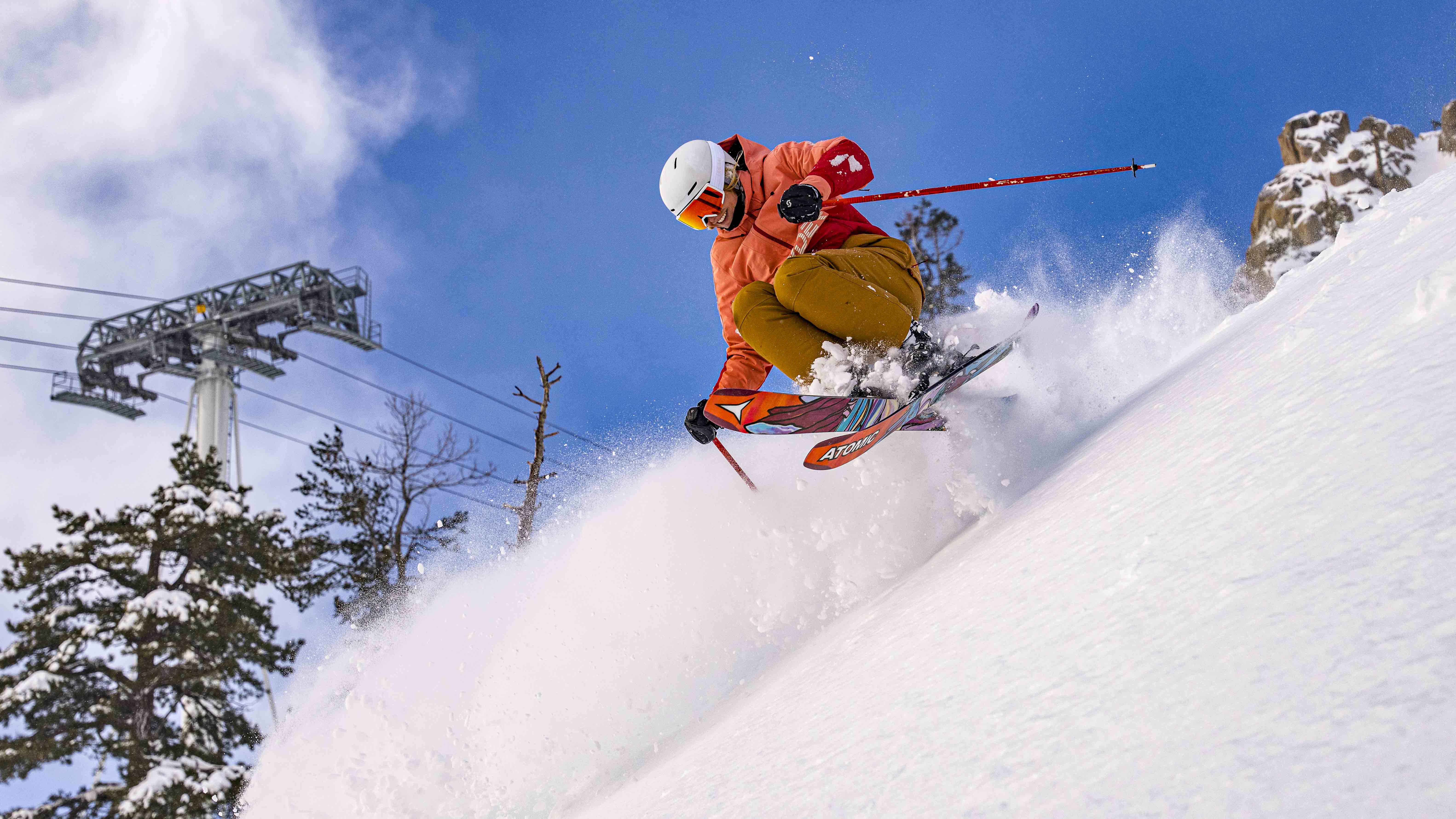 Amie Engerbretson rips down Broken Arrow on skis on a bluebird day.