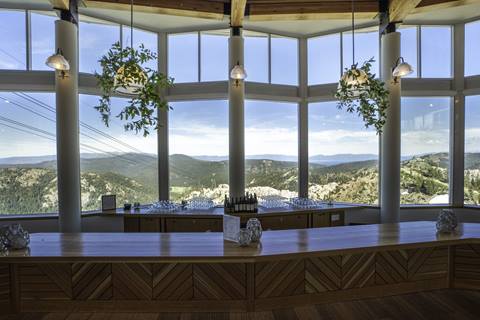 resort wedding venue cocktail space at palisades tahoe, offering elevated reception experiences with views of tahoe's alpine landscape