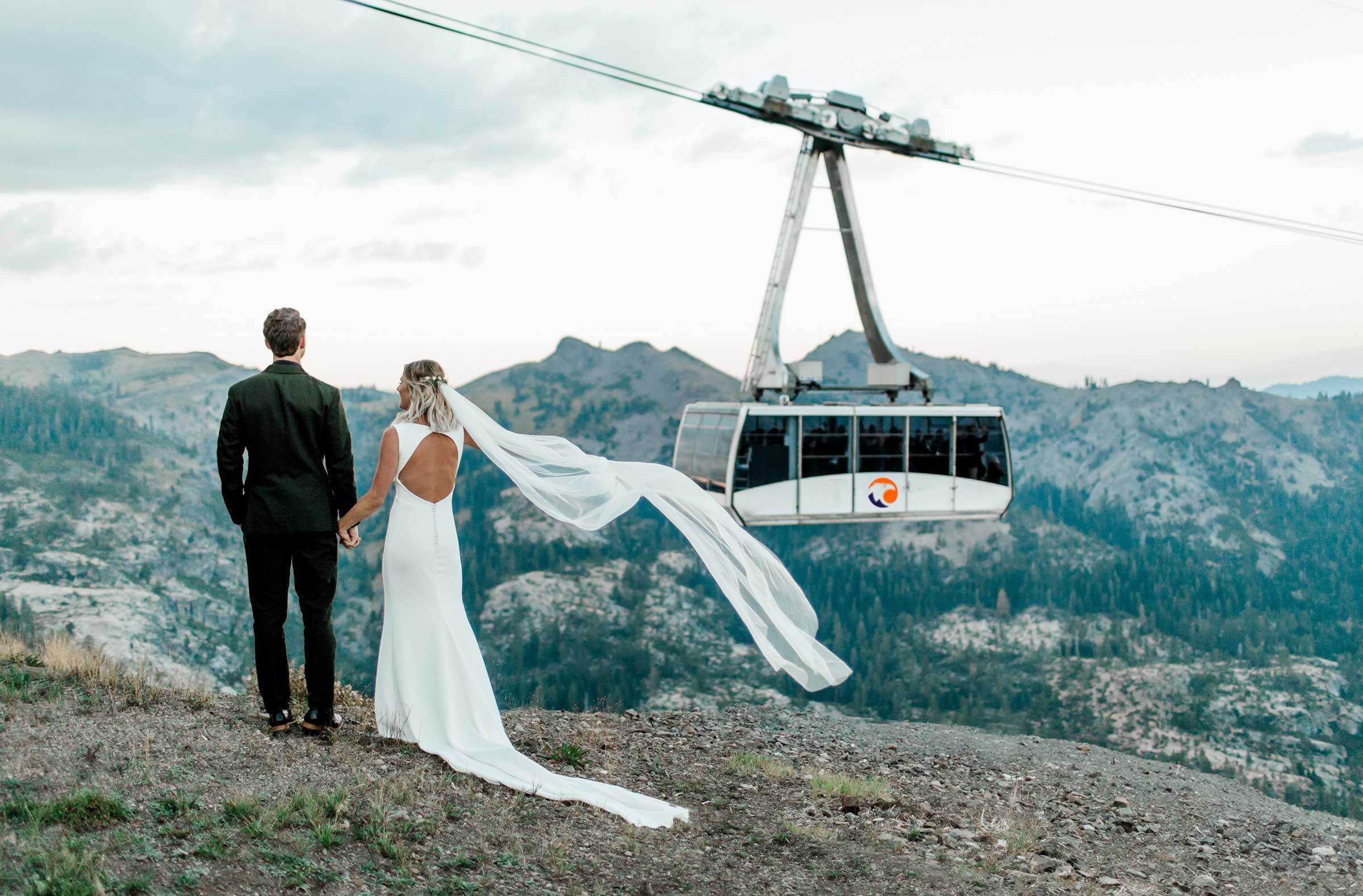 couple at mountaintop ceremony site, highlighting palisades tahoe as one of the most scenic lake tahoe wedding venues with gondola access.