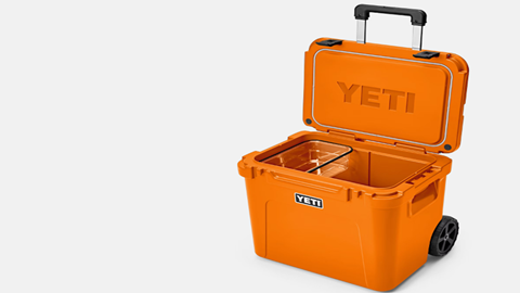 An orange Yeti cooler.
