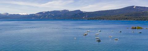 Scenic photo of boats on Lake Tahoe during summer