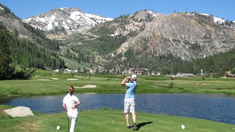 A couple plays a round of golf at the Links at the Resort at Squaw Creek.