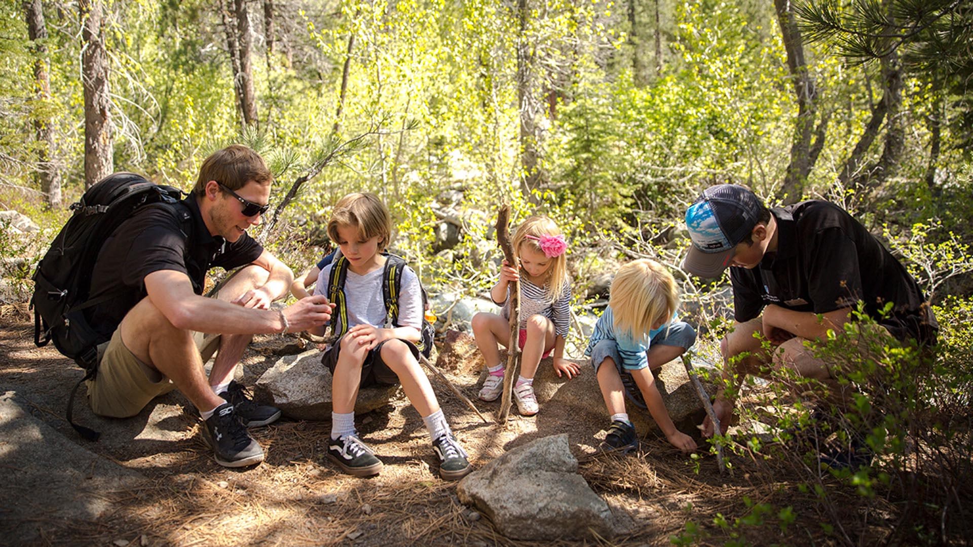 Kids enjoy a hike with their counselors at our Summer Adventure Camp.