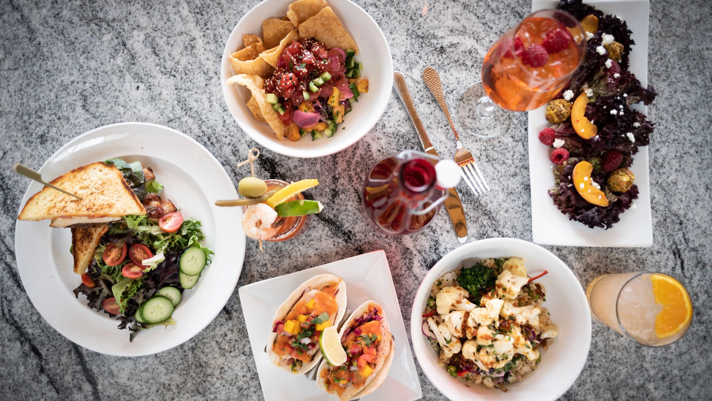 Spread of favorite plates and drinks at Palisades Tahoe's Granite Bistro