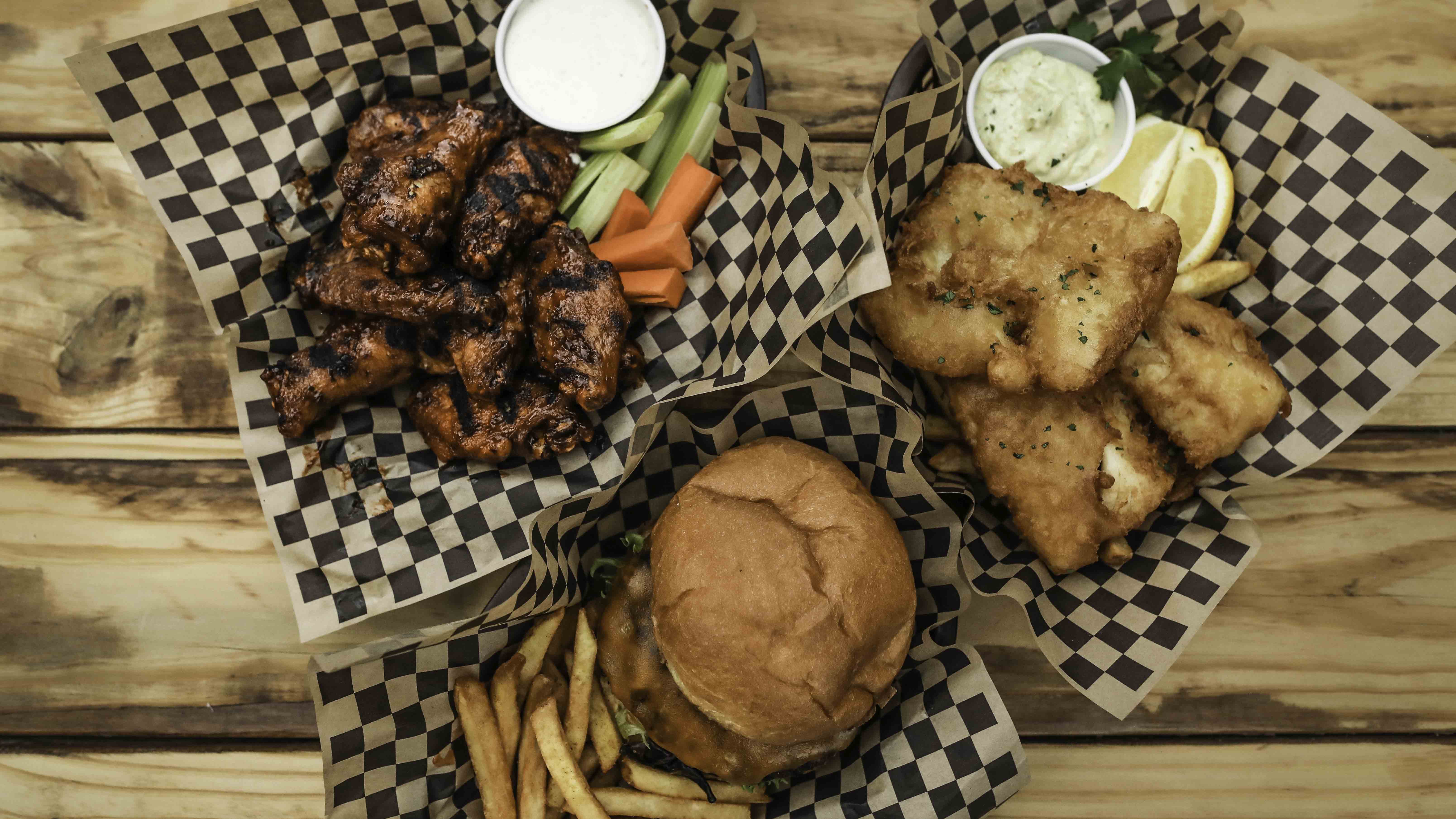 A burger, fish & chips, and wings from The Auld Dubliner Tahoe.