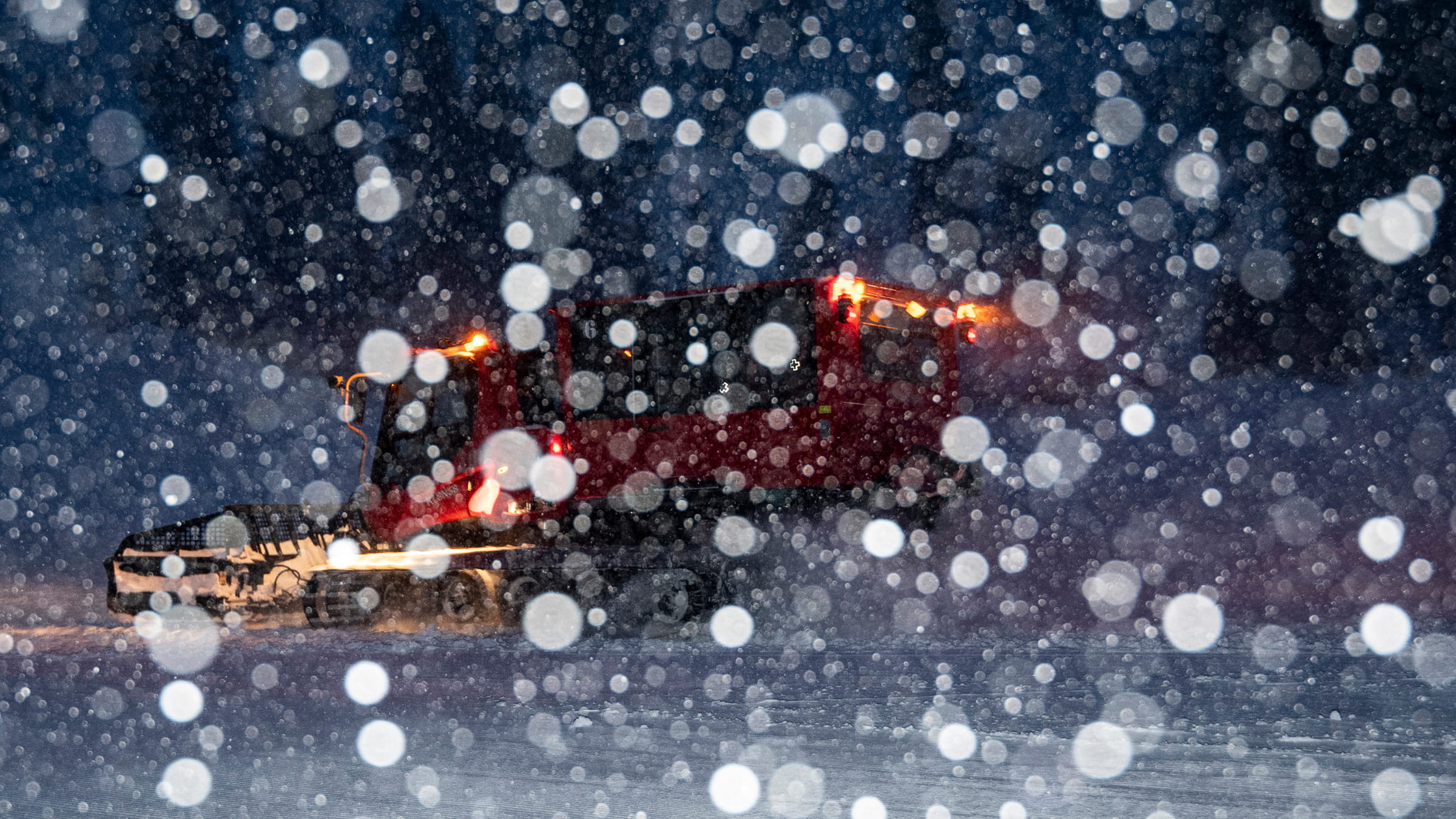 Snowfall during a blizzard in front of a snowcat at Alpine Meadows on January 27, 2021