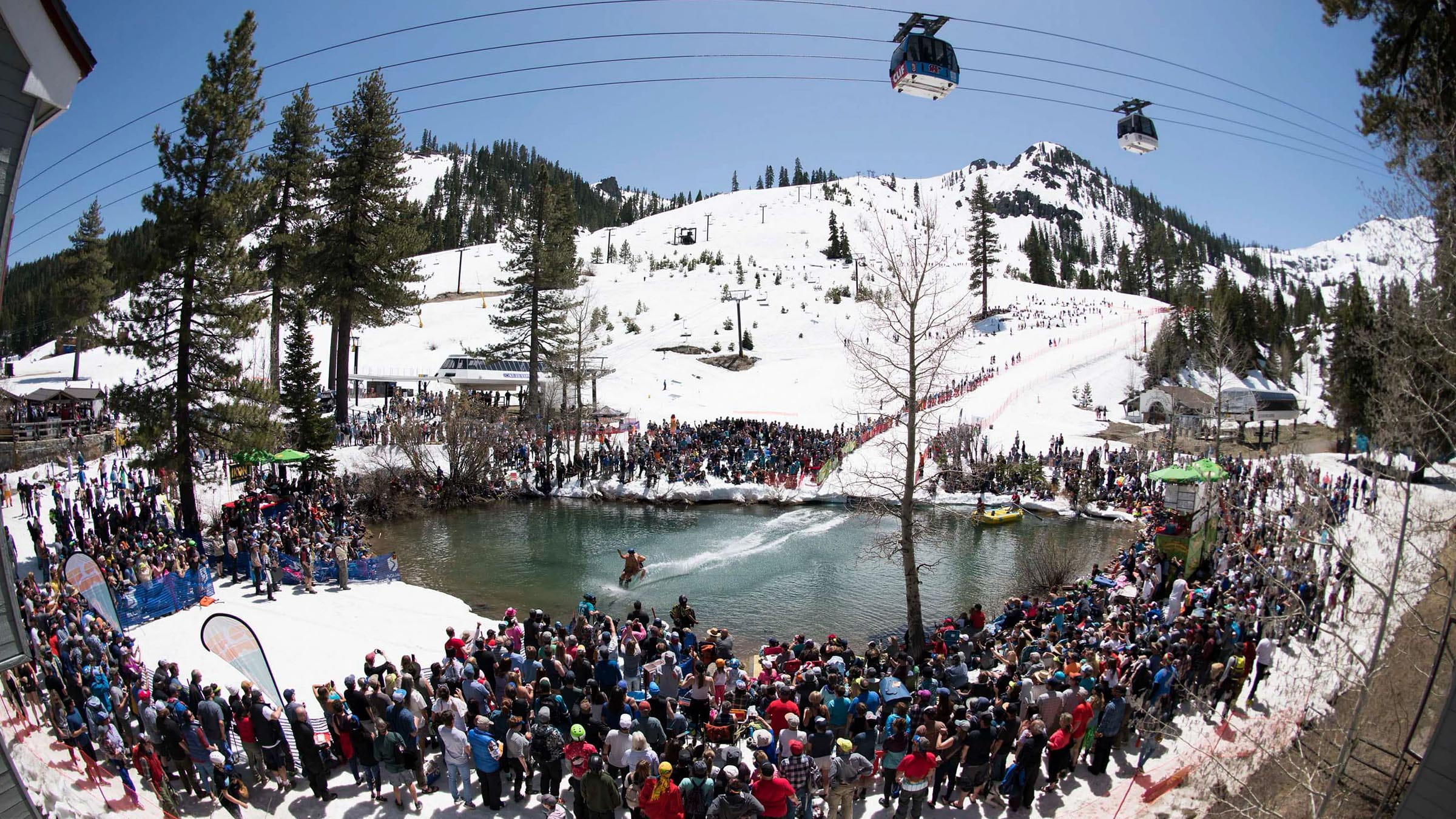 View of the Cushing Crossing, the original pond skimming event at Palisades Tahoe
