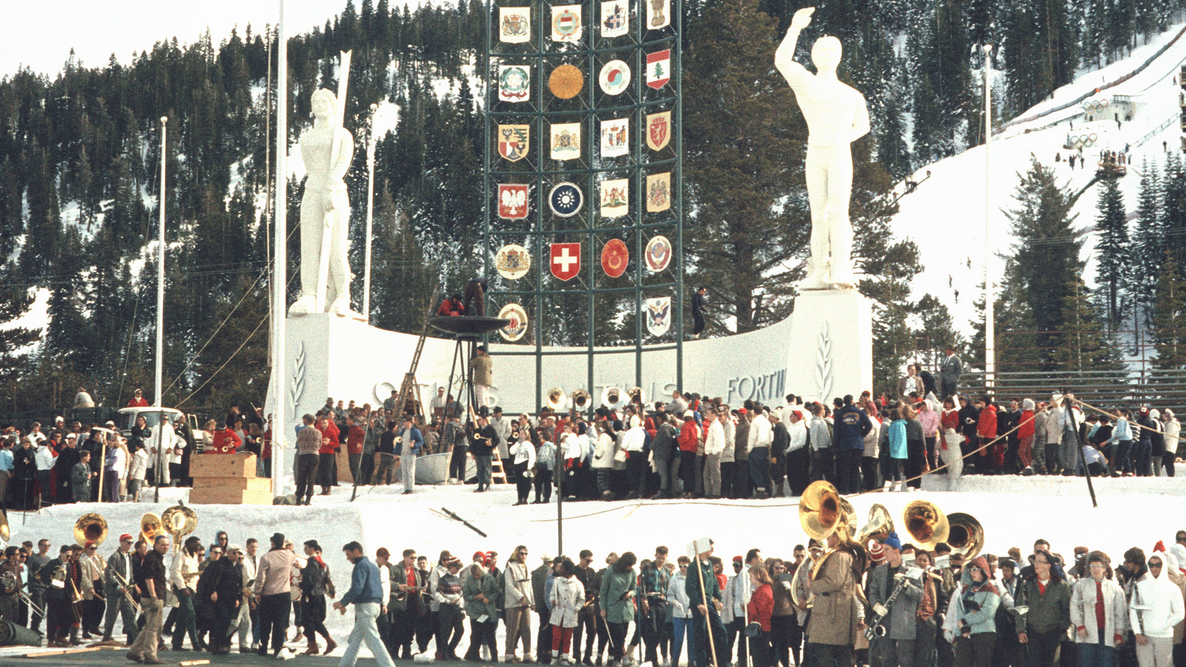 Historic photos of a crowd in front of the Olympic Rings at S* Valley during the 1960 Winter Games. Photo by Bill Briner