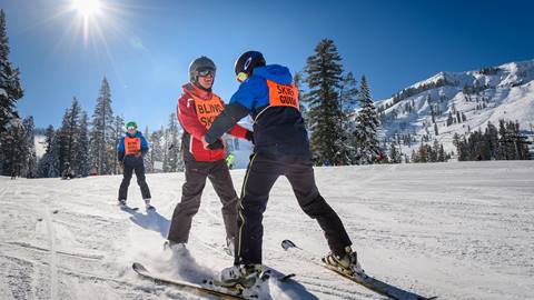 A blind skier learns to ski at Achieve Tahoe adaptive ski school at Alpine Meadows