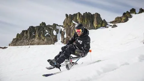 A disabled skier takes a run as part of an Achieve Tahoe program.