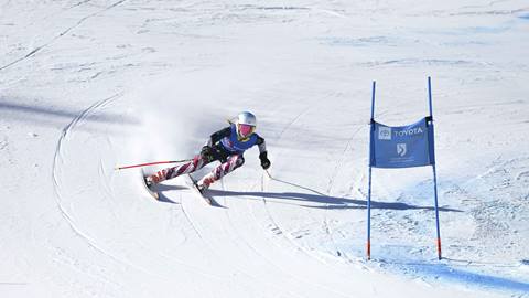 A skier cuts a turn as part of a race for the Alpine U12-U14 Far West Weekend team.