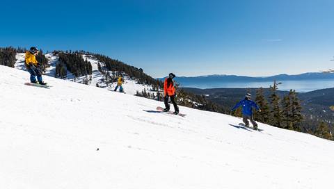 A snowboard instructor teaches a lesson at Alpine Meadows.