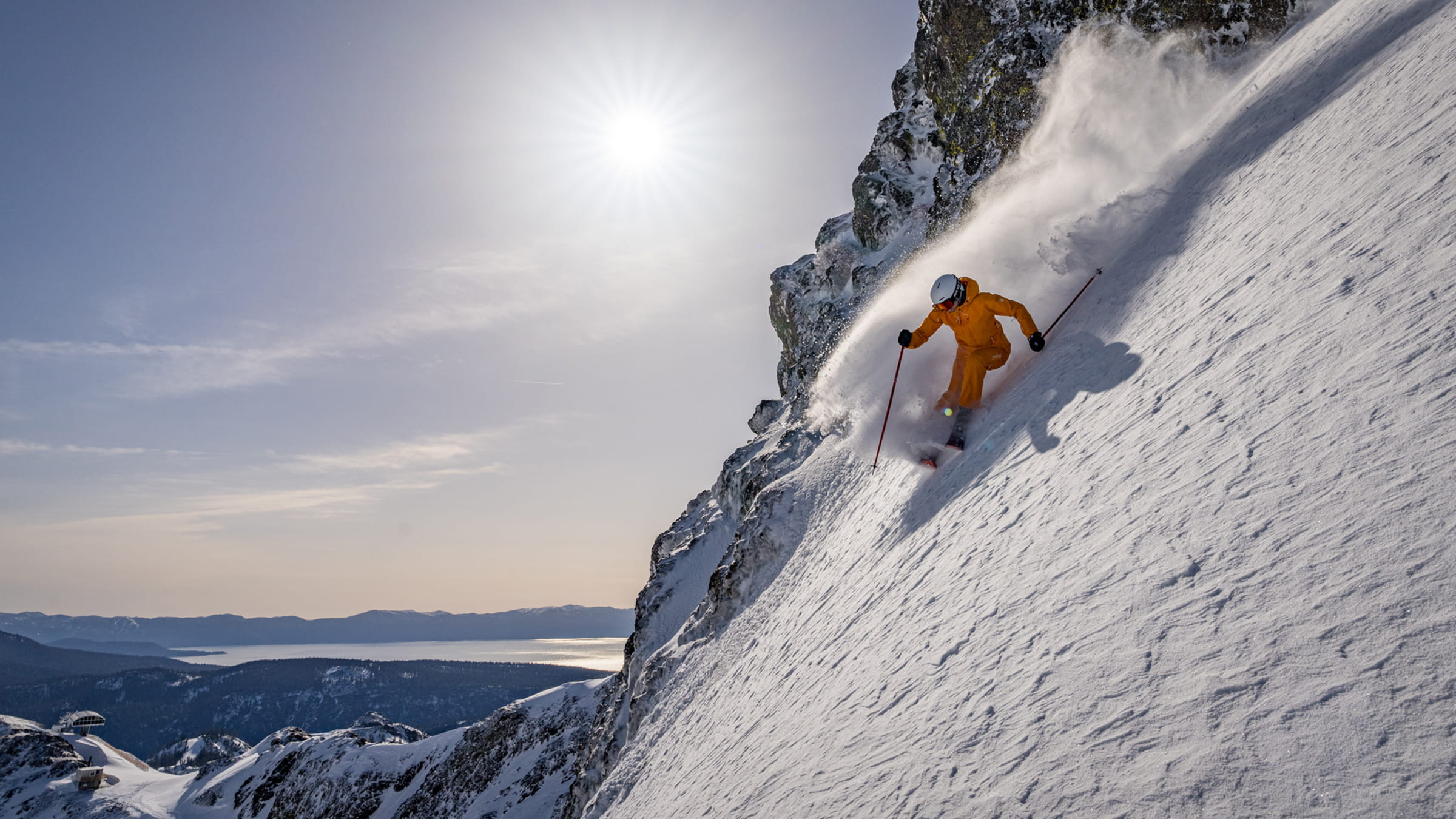 Amie Engerbretson skiing April powder on the upper mountain of Palisades Tahoe