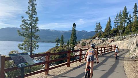 Children ride bikes along the East Shore Bike Path in Lake Tahoe, Nevada