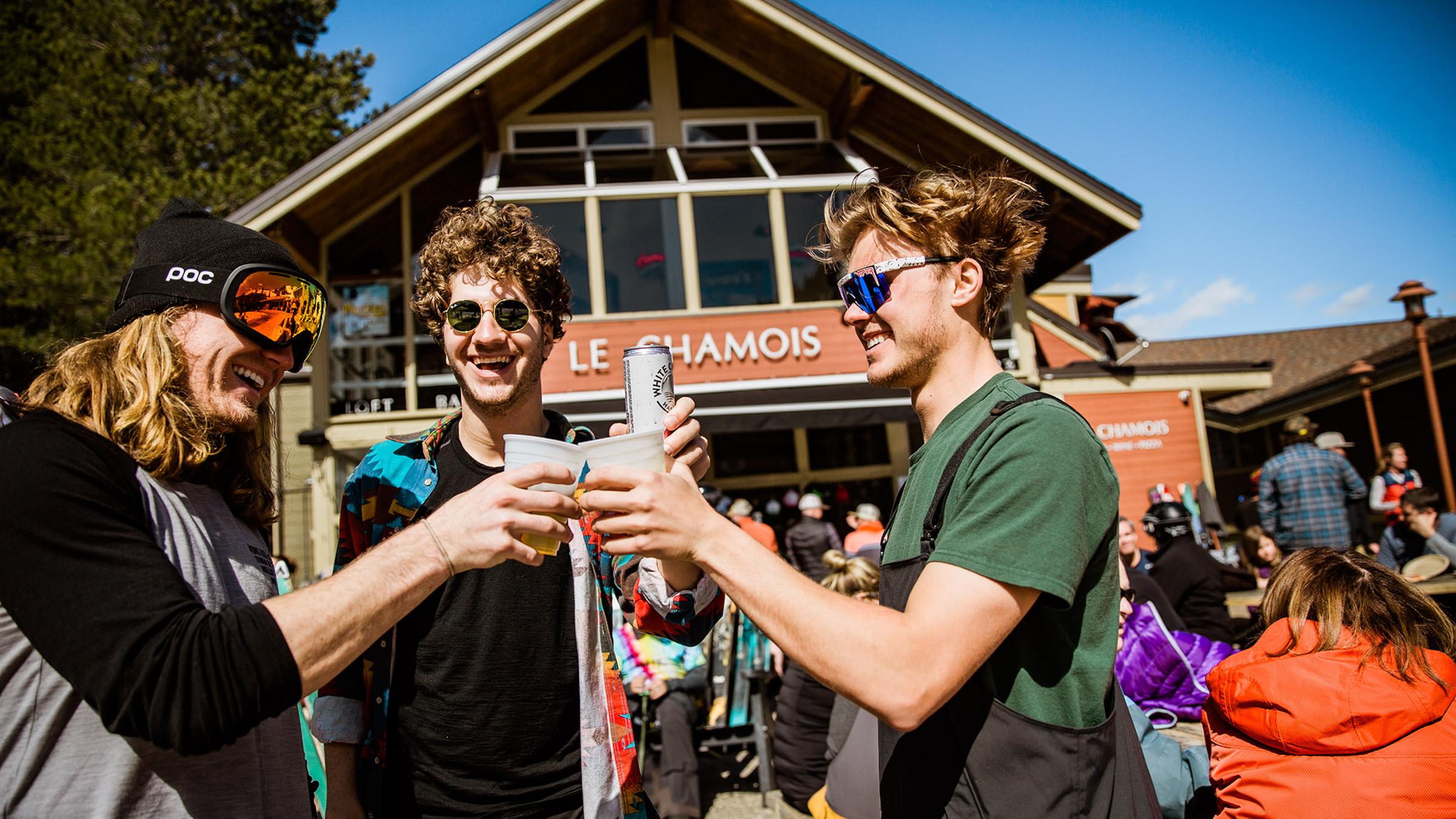 Three friends enjoy apres at the legendary Le Chamois at Squaw Valley